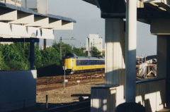 
NS train passing an Amsterdam Metro station, April 2003